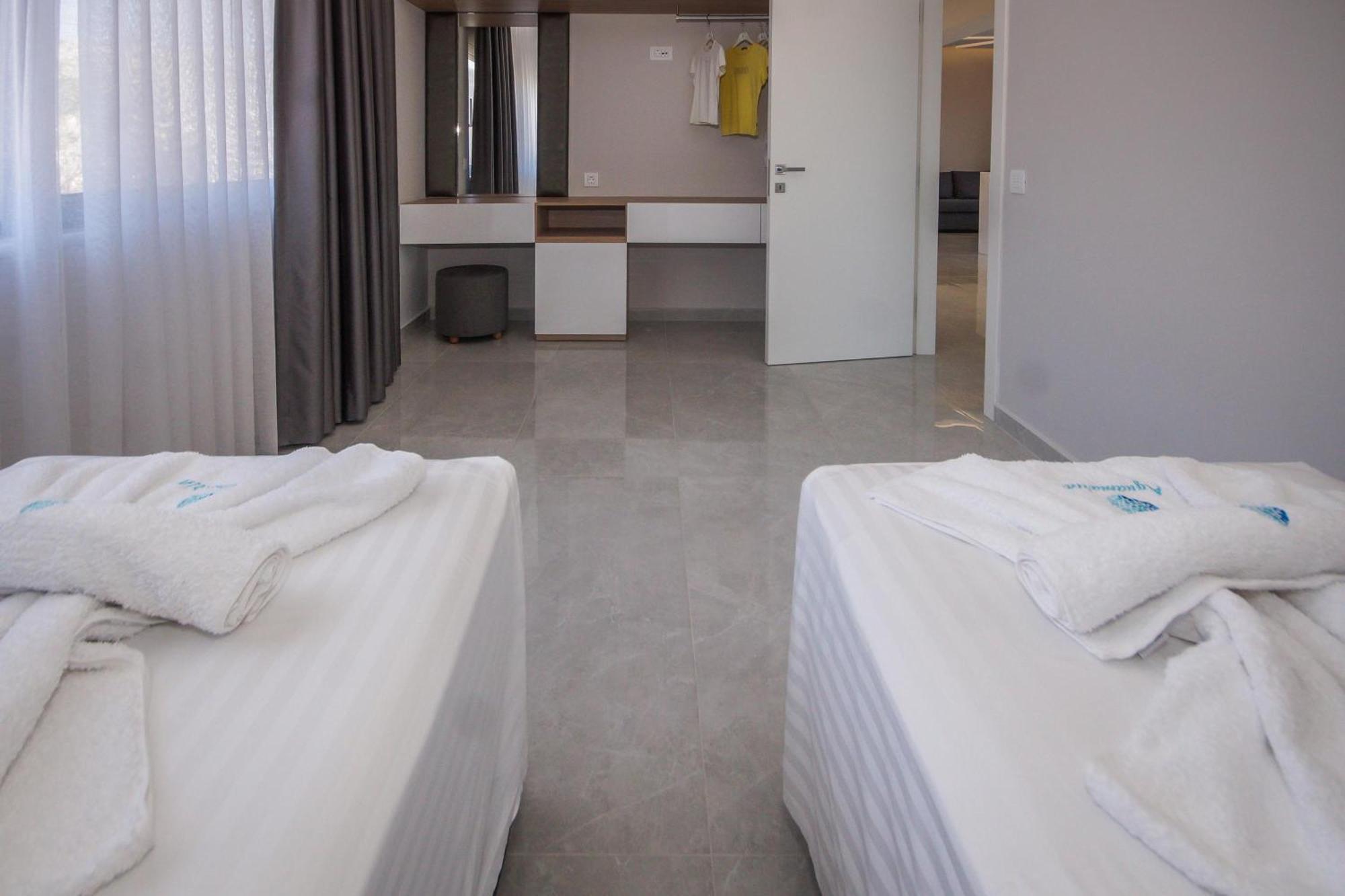 Aquamarine Luxury Suites Archangelos  Eksteriør billede