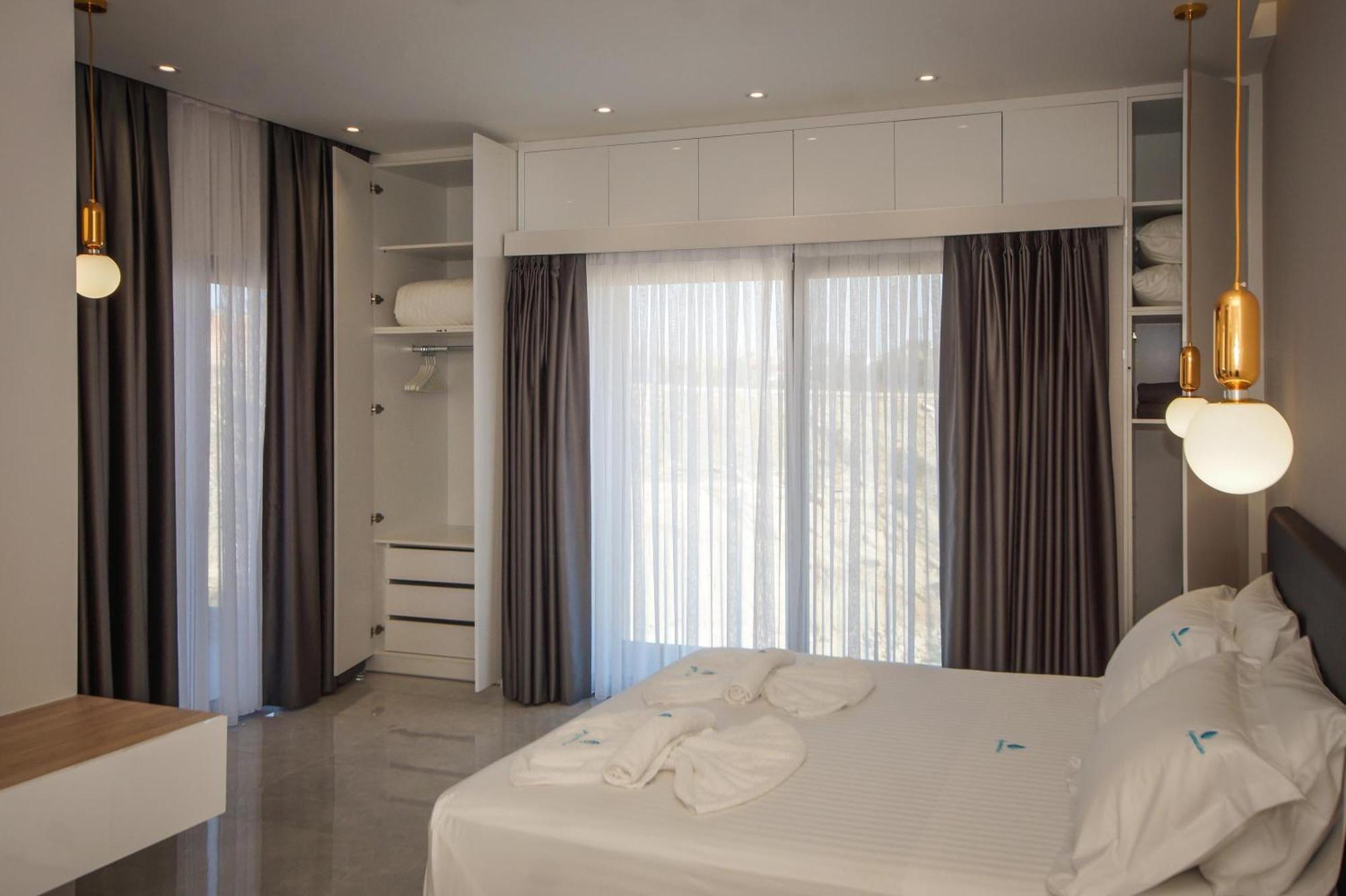 Aquamarine Luxury Suites Archangelos  Eksteriør billede